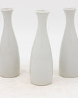 Collection of Three White Single Bud Vases, French Early 21st C.