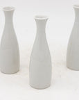 Collection of Three White Single Bud Vases, French Early 21st C.