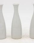 Collection of Three White Single Bud Vases, French Early 21st C.