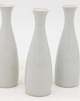 Collection of Three White Single Bud Vases, French Early 21st C.