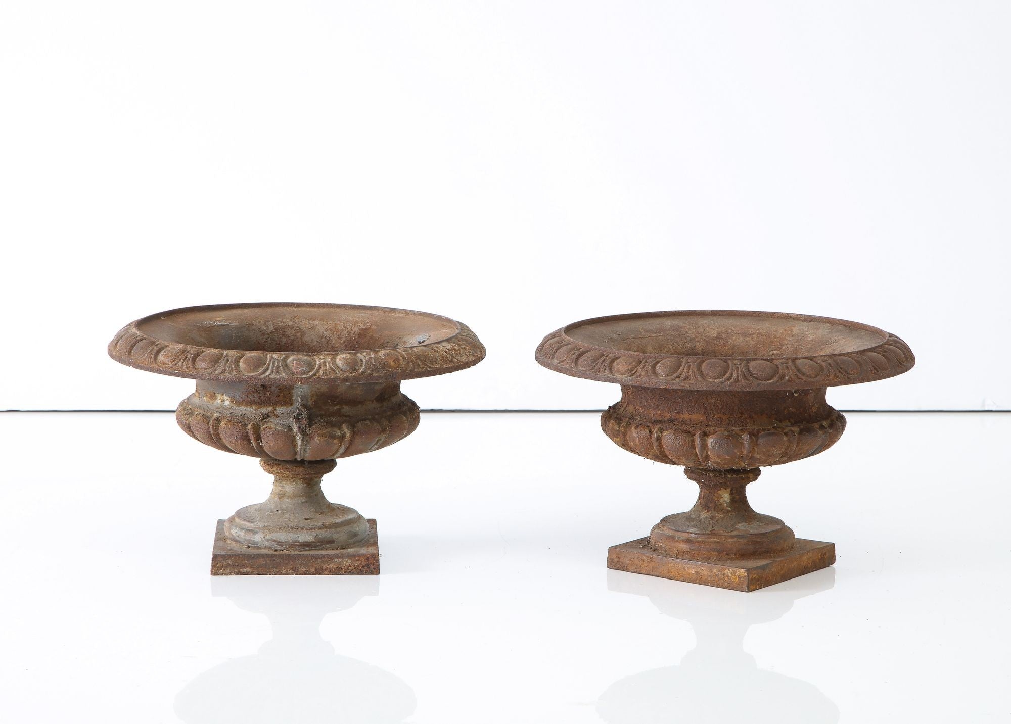 Pair Cast Iron Pie Crust Urns