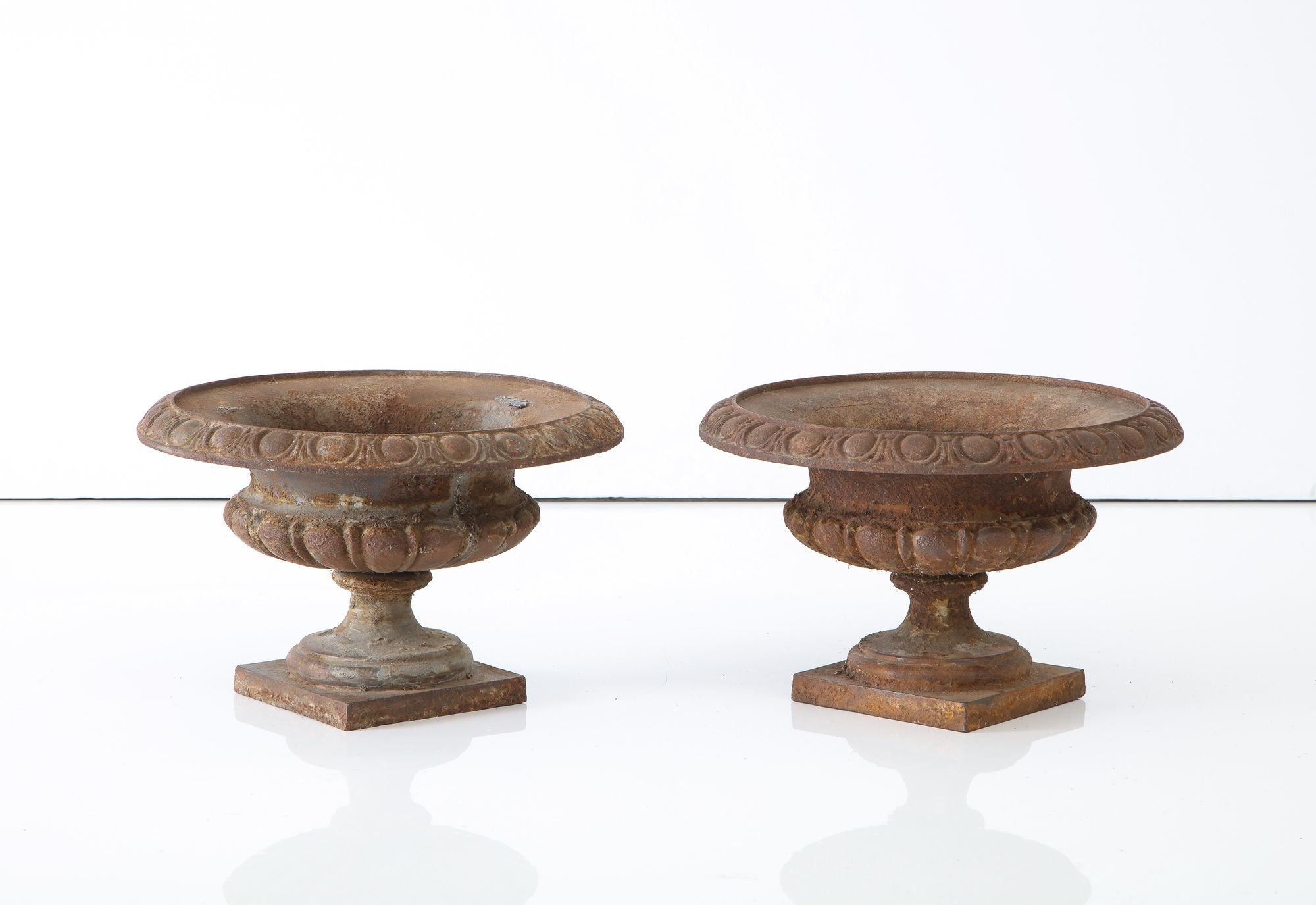 Pair Cast Iron Pie Crust Urns