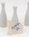 Collection of Three White Single Bud Vases, French Early 21st C.