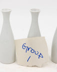 Collection of Three White Single Bud Vases, French Early 21st C.