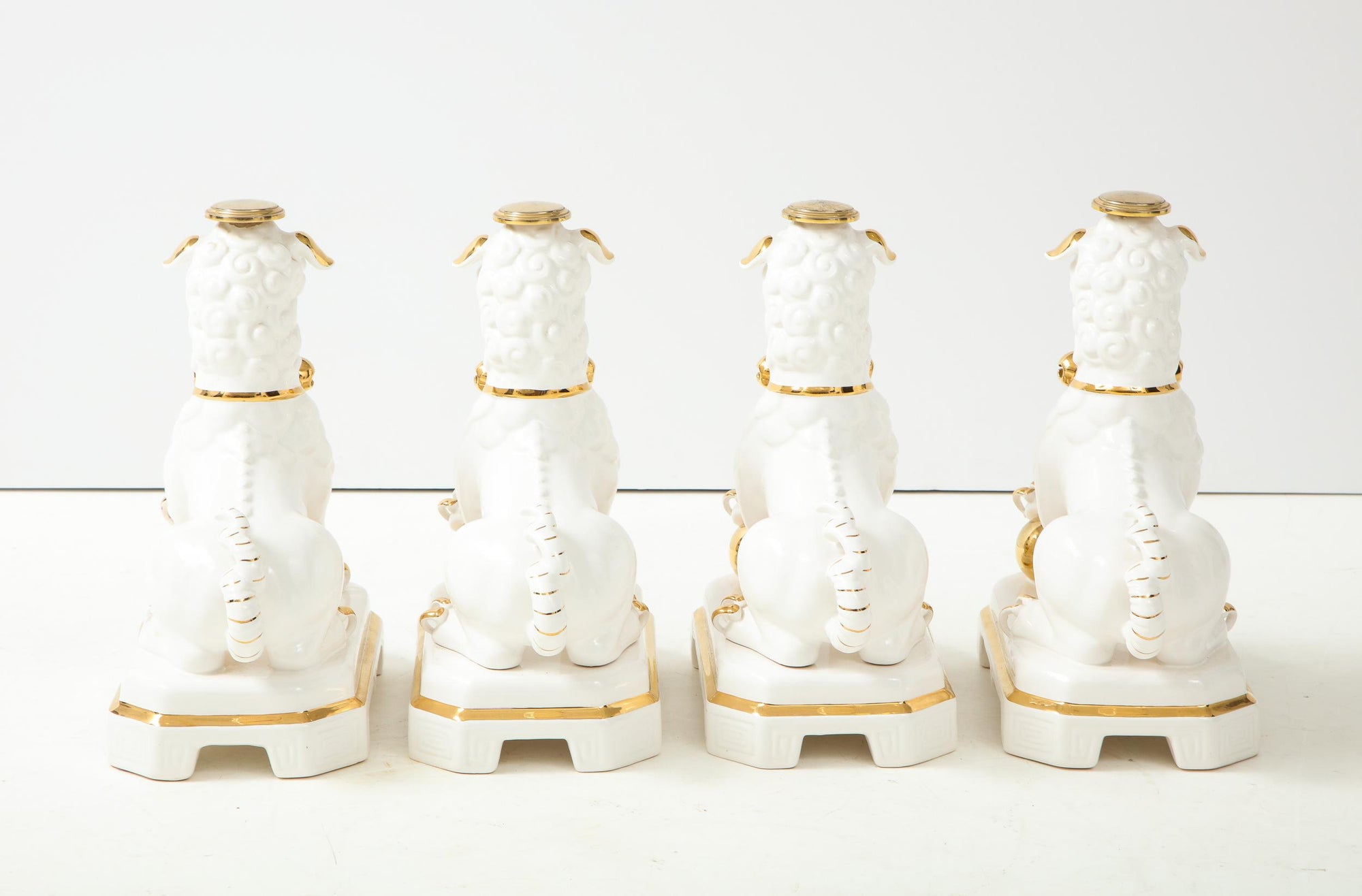 Set of Four Porcelain White & Gold Foo Dogs