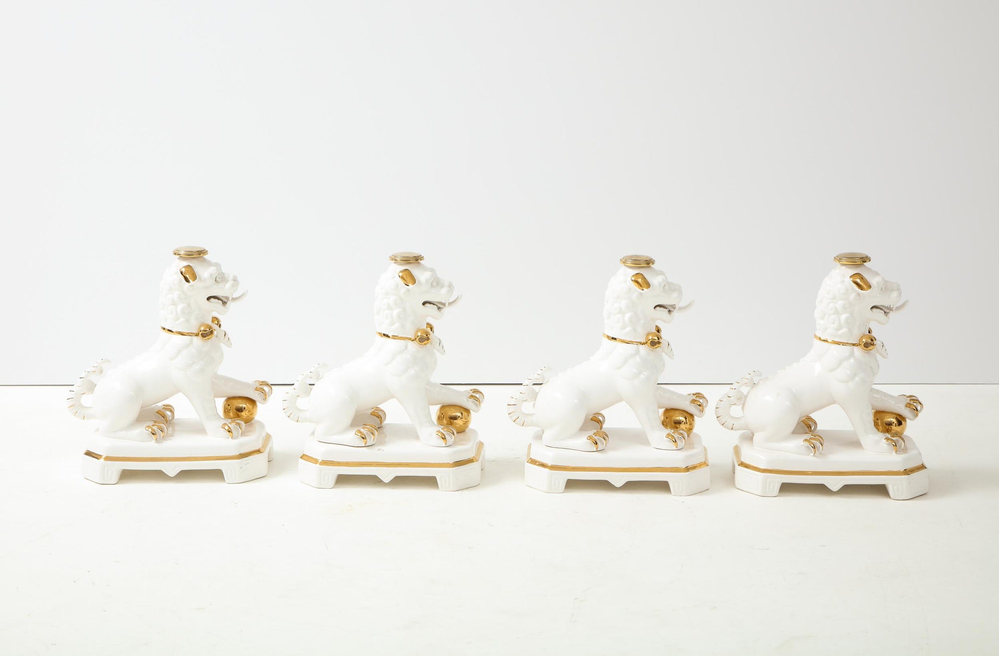 Set of Four Porcelain White & Gold Foo Dogs
