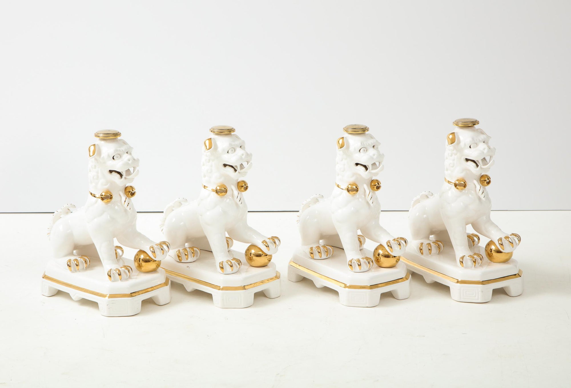 Set of Four Porcelain White & Gold Foo Dogs