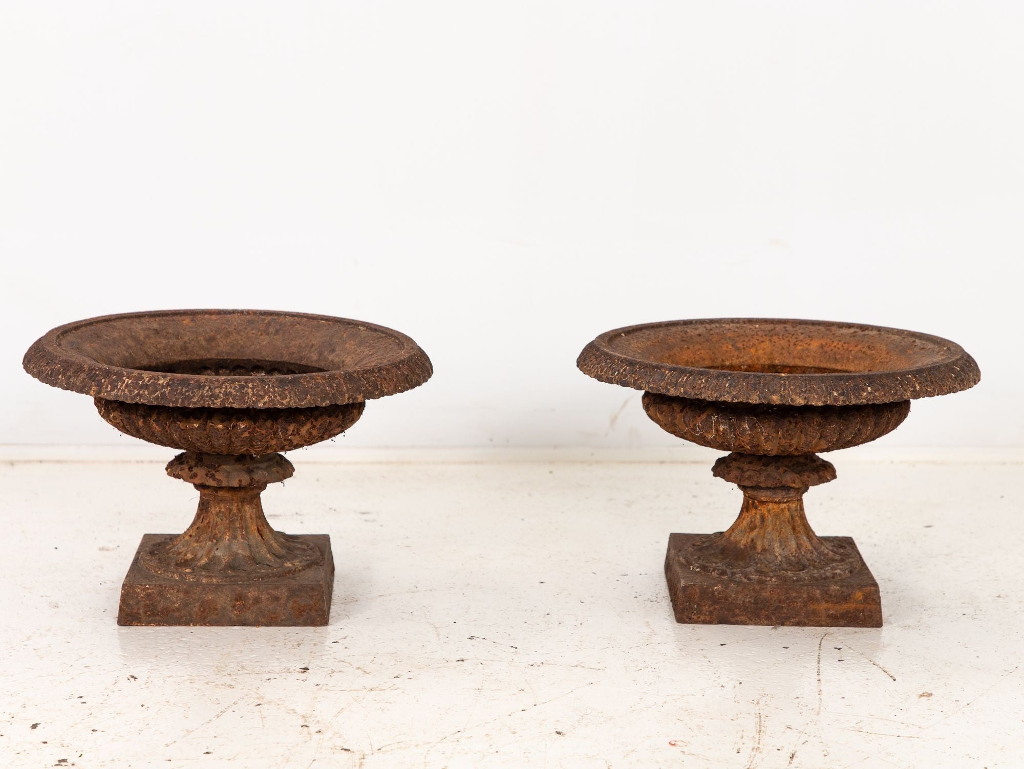 Pair of Neoclassical Cast Iron Urns, French early 20th C.