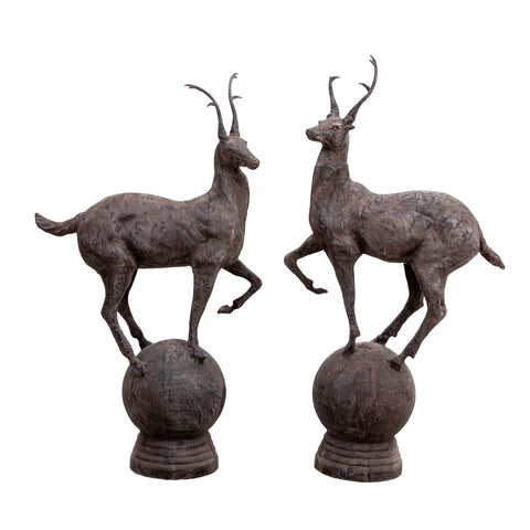 Pair Metal Stags on Globe, late 20th Century