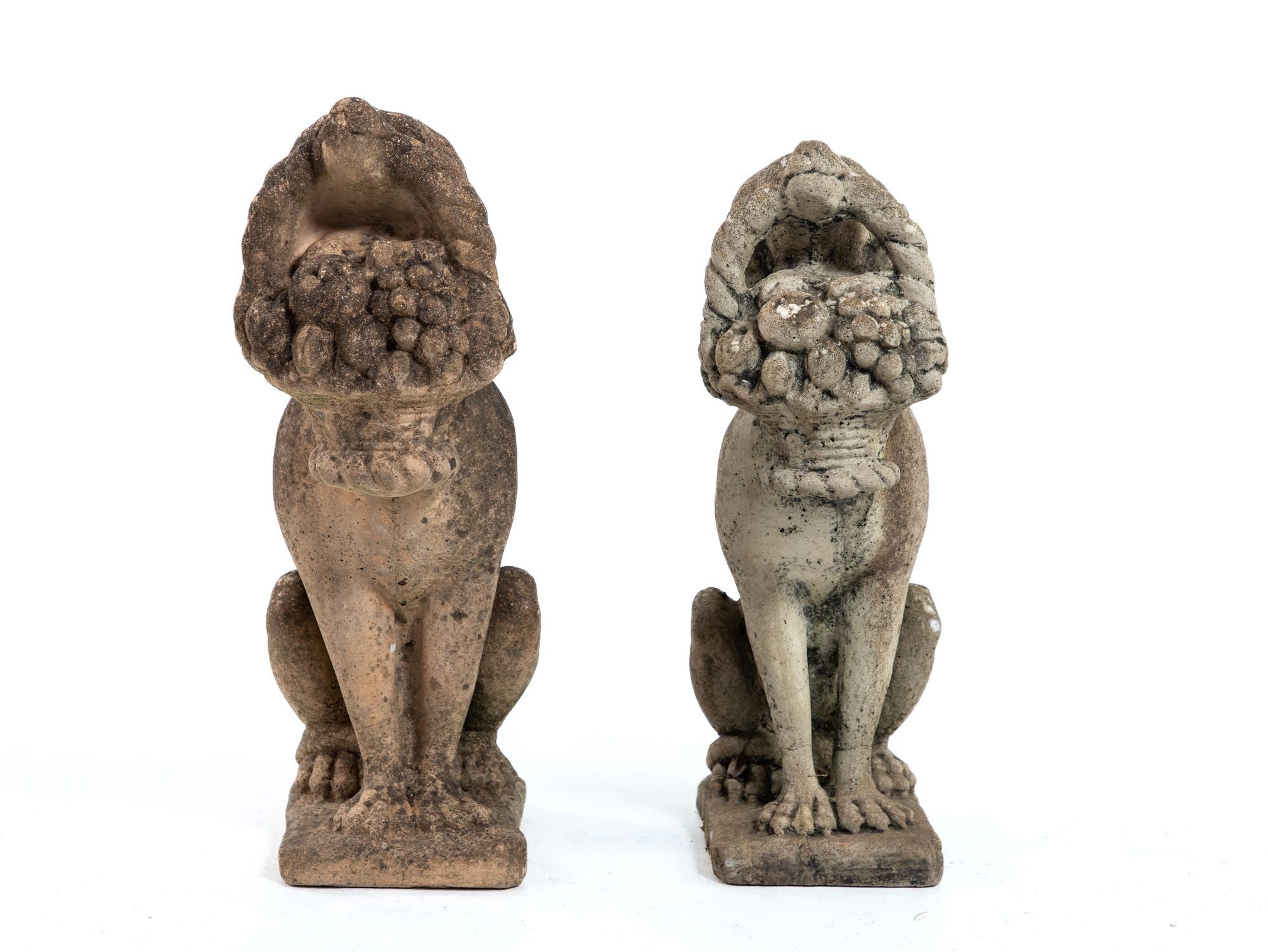 Matched Pair of Composite Stone Dogs with Fruit Baskets, England Mid 20th C.