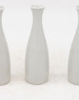 Collection of Three White Single Bud Vases, French Early 21st C.