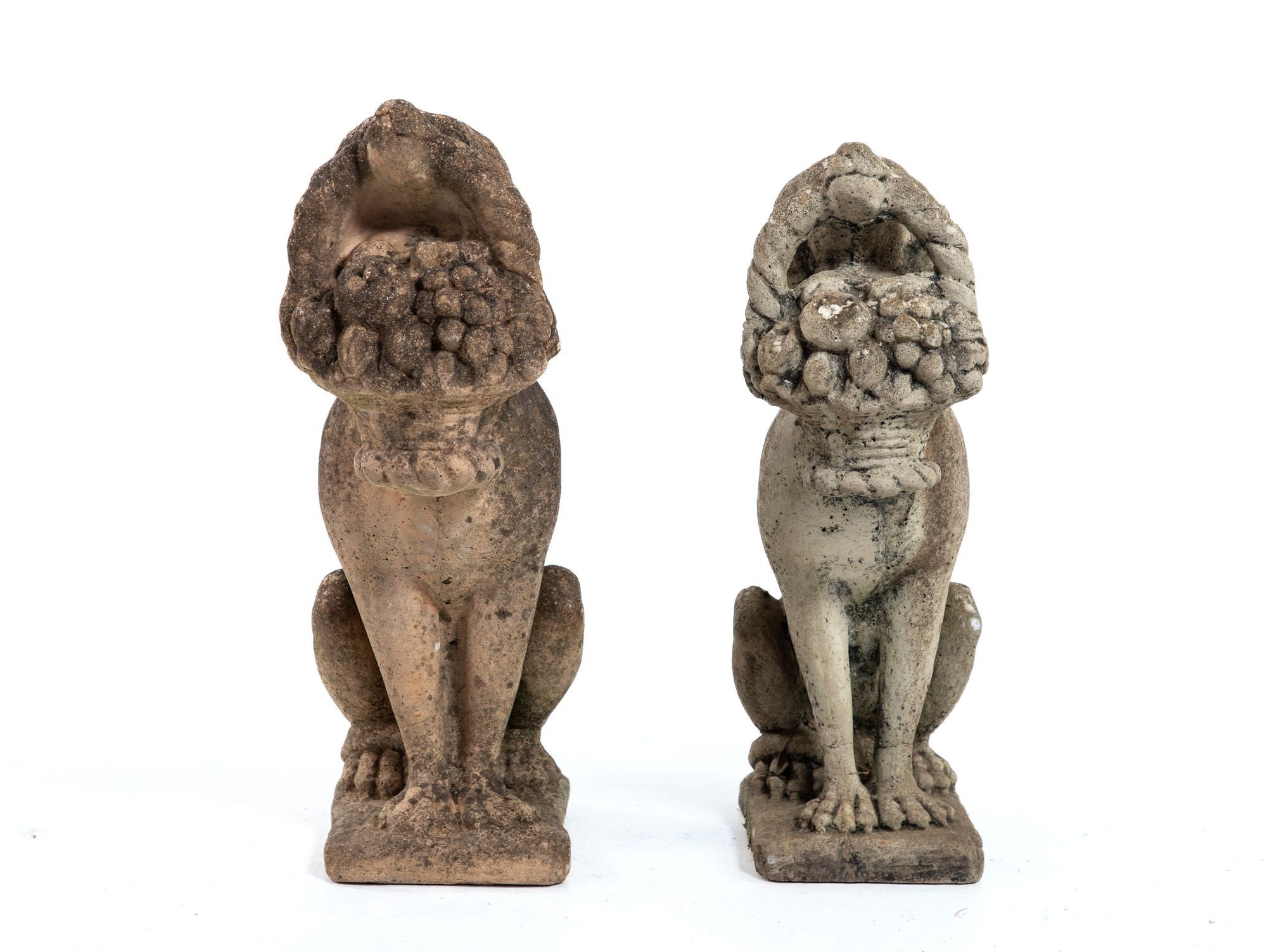 Matched Pair of Composite Stone Dogs with Fruit Baskets, England Mid 20th C.
