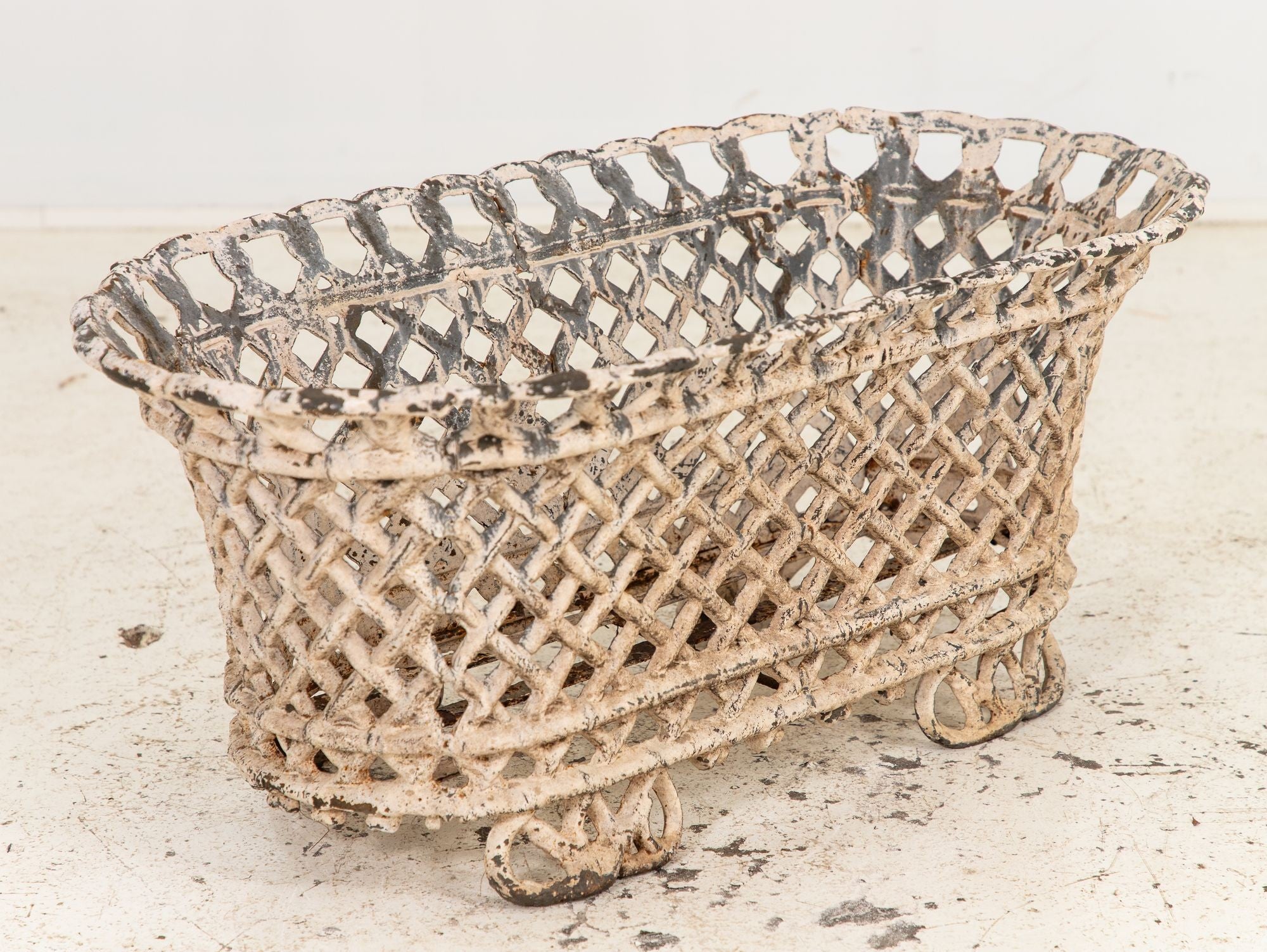 White Painted Cast Iron Latticework Basket, French early 20th C.