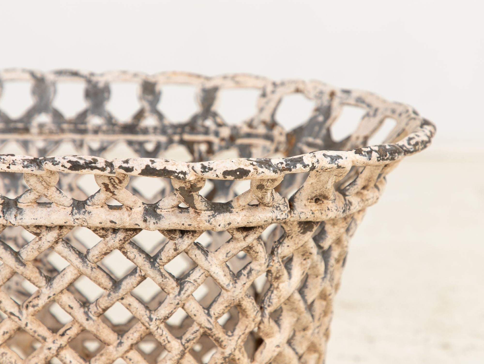 White Painted Cast Iron Latticework Basket, French early 20th C.
