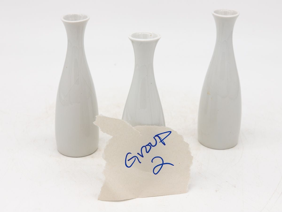 Collection of Three White Single Bud Vases, French Early 21st C.